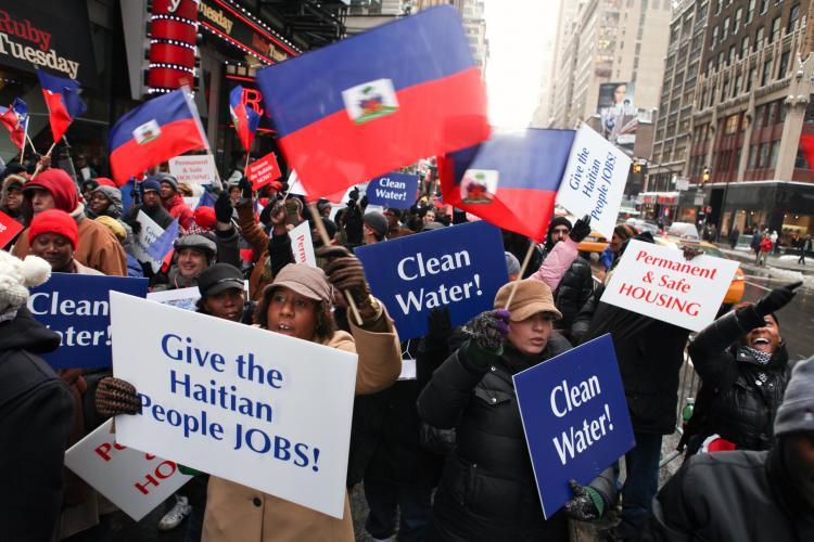 <a><img src="https://www.theepochtimes.com/assets/uploads/2015/09/haiti.jpg" alt="Marking the one-year anniversary of the massive earthquake in Haiti, Haitians and supporters rallied in Times Square and subsequently marched to the Haitian Consulate in New York City on Wednesday to urge faster relief for the country. (Amal Chen/The Epoch Times)" title="Marking the one-year anniversary of the massive earthquake in Haiti, Haitians and supporters rallied in Times Square and subsequently marched to the Haitian Consulate in New York City on Wednesday to urge faster relief for the country. (Amal Chen/The Epoch Times)" width="320" class="size-medium wp-image-1809759"/></a>
