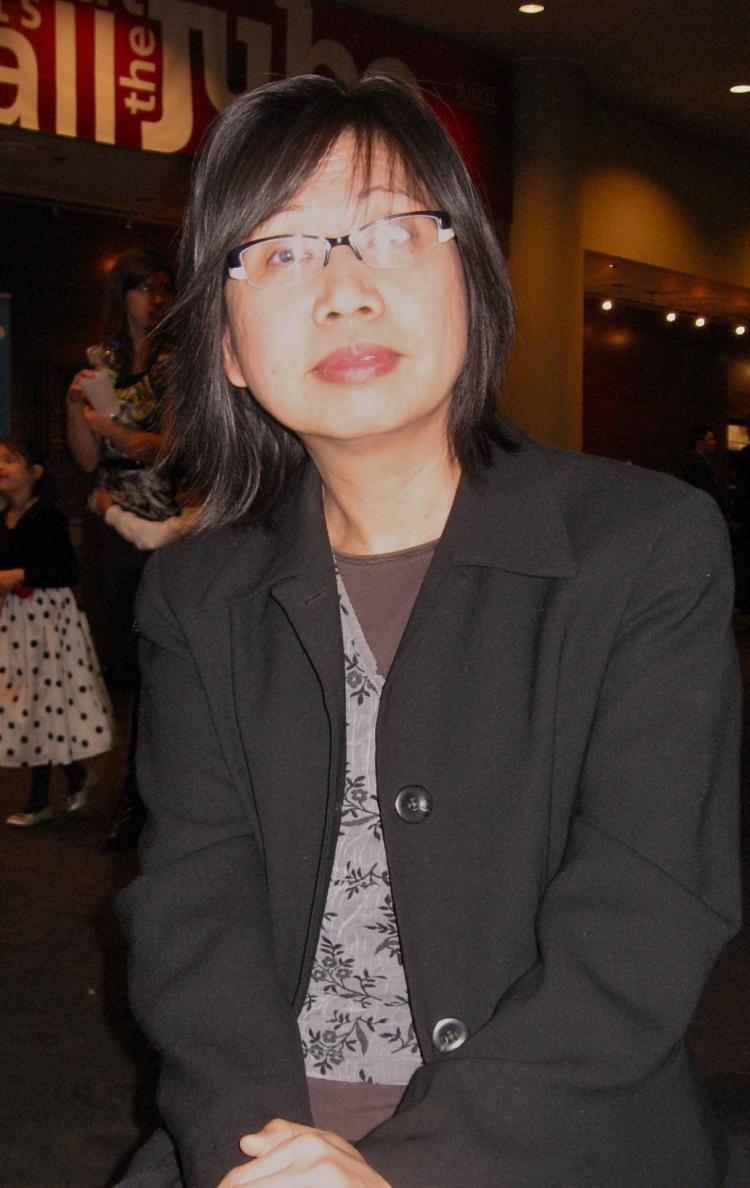 <a><img src="https://www.theepochtimes.com/assets/uploads/2015/09/kimhuynhc1.jpg" alt="Ms. Huynh at Shen Yun Performing Arts in Calgary on March 28. (Beichen Sun/The Epoch Times)" title="Ms. Huynh at Shen Yun Performing Arts in Calgary on March 28. (Beichen Sun/The Epoch Times)" width="320" class="size-medium wp-image-1806277"/></a>