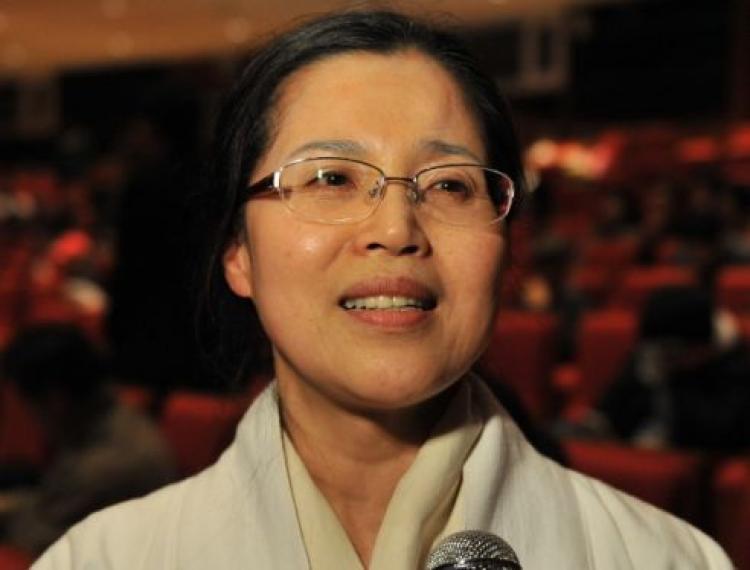 <a><img src="https://www.theepochtimes.com/assets/uploads/2015/09/leeK.jpg" alt="Ms. Lee, dean of Busan Zen Buddhist Center, says that it is an honor to watch the Divine Performing Arts show and will bring the message to those who still don't know about the show. (Renquan Zheng/The Epoch Times)" title="Ms. Lee, dean of Busan Zen Buddhist Center, says that it is an honor to watch the Divine Performing Arts show and will bring the message to those who still don't know about the show. (Renquan Zheng/The Epoch Times)" width="320" class="size-medium wp-image-1830835"/></a>