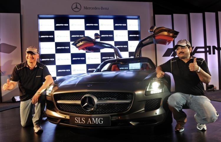 <a><img src="https://www.theepochtimes.com/assets/uploads/2015/09/mercedes_102928171.jpg" alt="Managing Director and CEO of Mercedes-Benz India Wilfried Aulbur (L) and MD Sales and Marketing, Debashish Mitra pose with the new Mercedes-Benz SLS AMG luxury sports car during its launch in New Delhi on July 16. (Prakash Singh/AFP/Getty Images)" title="Managing Director and CEO of Mercedes-Benz India Wilfried Aulbur (L) and MD Sales and Marketing, Debashish Mitra pose with the new Mercedes-Benz SLS AMG luxury sports car during its launch in New Delhi on July 16. (Prakash Singh/AFP/Getty Images)" width="320" class="size-medium wp-image-1817063"/></a>