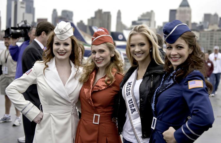 <a><img src="https://www.theepochtimes.com/assets/uploads/2015/09/miss+usaWEB.jpg" alt="HELPING OUT: Miss USA Kristen Dalton (2nd from R) was joined by Melanie Lemieux (White) Siri Howard (Red) and Kaitlin Monte (Blue) and more than 450 volunteers from the USO, Coca Cola, and Texas Roadhouse, to help pack goody bags aboard the Intrepid Sea, Air & Space Museum on Tuesday. The group packed 10,000 bags that will be shipped to troops from the tri-state area who are currently serving in Iraq and Afghanistan. (Aloysio Santos/The Epoch Times)" title="HELPING OUT: Miss USA Kristen Dalton (2nd from R) was joined by Melanie Lemieux (White) Siri Howard (Red) and Kaitlin Monte (Blue) and more than 450 volunteers from the USO, Coca Cola, and Texas Roadhouse, to help pack goody bags aboard the Intrepid Sea, Air & Space Museum on Tuesday. The group packed 10,000 bags that will be shipped to troops from the tri-state area who are currently serving in Iraq and Afghanistan. (Aloysio Santos/The Epoch Times)" width="320" class="size-medium wp-image-1821105"/></a>