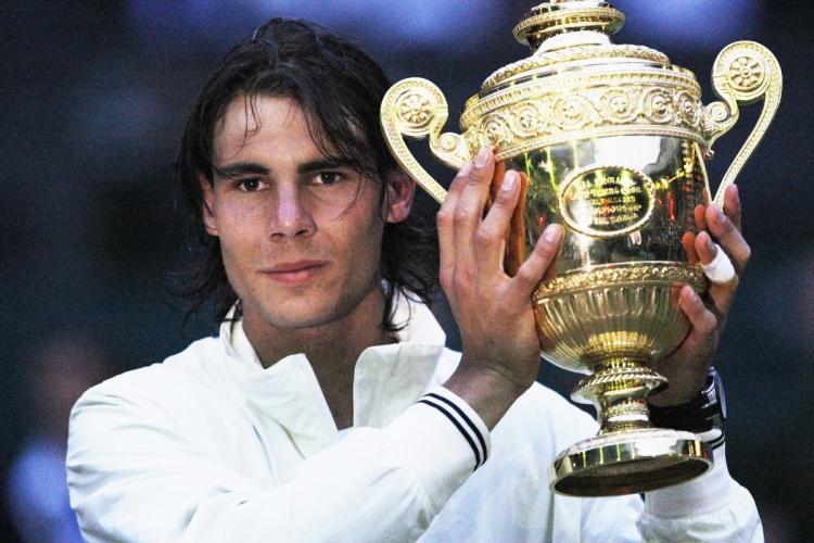 <a><img src="https://www.theepochtimes.com/assets/uploads/2015/09/nadal.jpg" alt="Spains Rafael Nadal poses with his trophy after defeating Switzerlands Roger Federer during the final match of the 2008 Wimbledon championships on Sunday. (Adrian Dennis/AFP/Getty Images)" title="Spains Rafael Nadal poses with his trophy after defeating Switzerlands Roger Federer during the final match of the 2008 Wimbledon championships on Sunday. (Adrian Dennis/AFP/Getty Images)" width="320" class="size-medium wp-image-1835088"/></a>