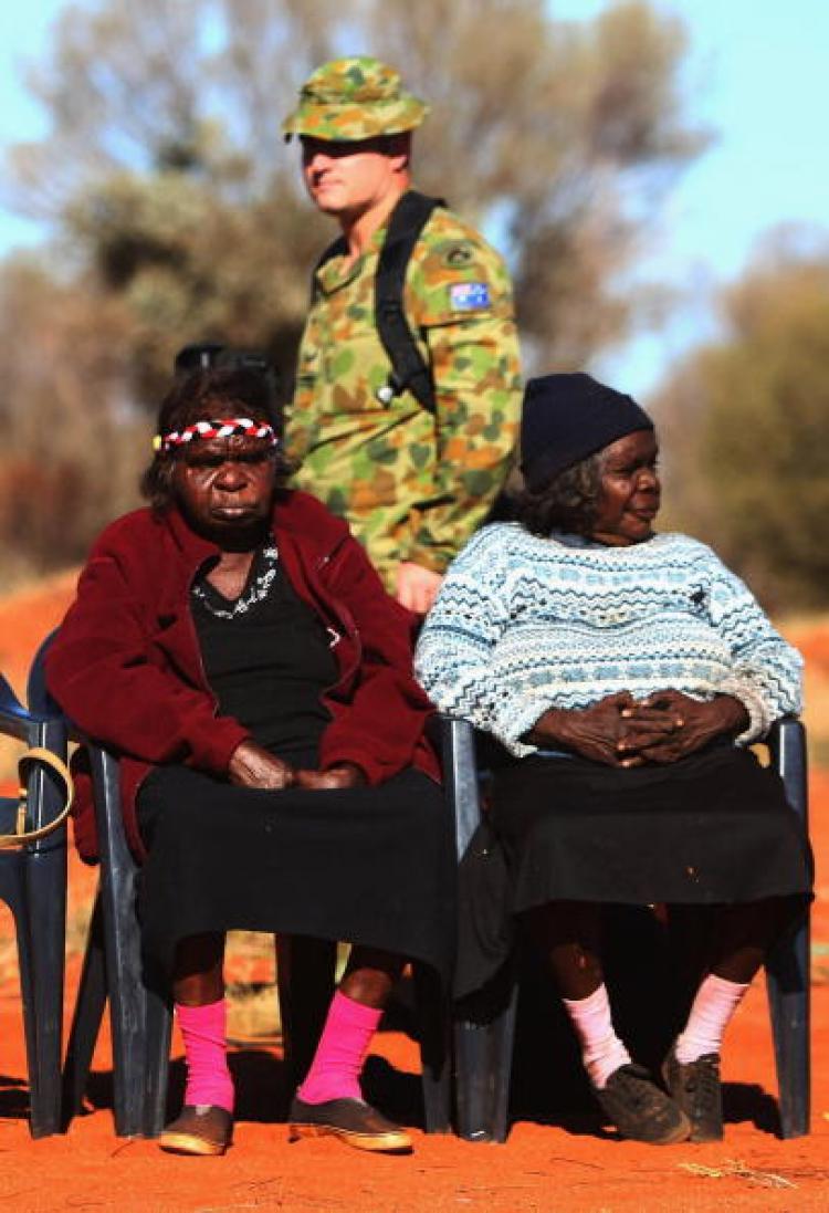 <a><img src="https://www.theepochtimes.com/assets/uploads/2015/09/nter_75093038.jpg" alt="A member of the Australian Army walks by as Aboriginal women gather for a meeting on July 6, 2007 at Mutitjulu, near Alice Springs. The Federal Government has restated its support for the Northern Territory intervention in Indigenous communities. (Ian Walie/Getty Images)" title="A member of the Australian Army walks by as Aboriginal women gather for a meeting on July 6, 2007 at Mutitjulu, near Alice Springs. The Federal Government has restated its support for the Northern Territory intervention in Indigenous communities. (Ian Walie/Getty Images)" width="320" class="size-medium wp-image-1833190"/></a>