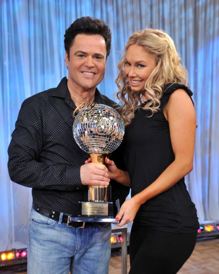 <a><img src="https://www.theepochtimes.com/assets/uploads/2015/09/osmond93418300.jpg" alt="Entertainer Donny Osmond and Kym Johnson visit following their win on 'Dancing with the Stars.' (Henry S. Dziekan III/Getty Images)" title="Entertainer Donny Osmond and Kym Johnson visit following their win on 'Dancing with the Stars.' (Henry S. Dziekan III/Getty Images)" width="320" class="size-medium wp-image-1825030"/></a>