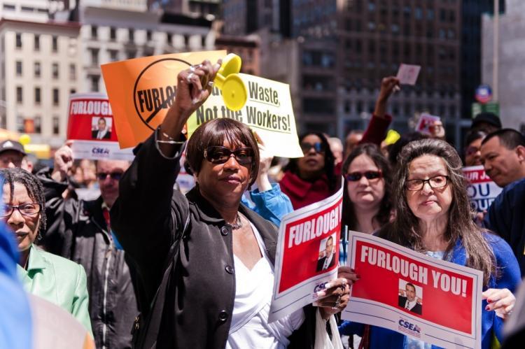 <a><img src="https://www.theepochtimes.com/assets/uploads/2015/09/rally1.jpg" alt="State workers protest furloughs at the 90 Center Street Federal Office Building in Lower Manhattan on Monday. (Aloysio Santos/The Epoch Times)" title="State workers protest furloughs at the 90 Center Street Federal Office Building in Lower Manhattan on Monday. (Aloysio Santos/The Epoch Times)" width="320" class="size-medium wp-image-1820078"/></a>