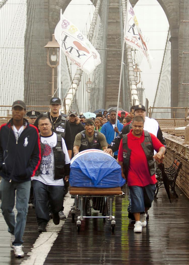 <a><img src="https://www.theepochtimes.com/assets/uploads/2015/09/rallyWEB.jpg" alt="Demonstrators against gun violence walked across the Brooklyn Bridge on Wednesday in the 'Tsumani of Peace' march. (Henry Lam/The Epoch Times)" title="Demonstrators against gun violence walked across the Brooklyn Bridge on Wednesday in the 'Tsumani of Peace' march. (Henry Lam/The Epoch Times)" width="320" class="size-medium wp-image-1815514"/></a>
