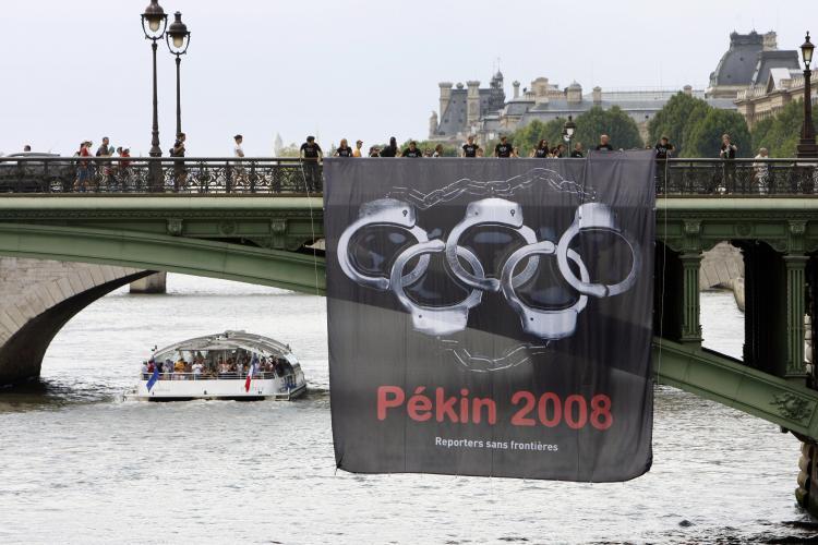 <a><img src="https://www.theepochtimes.com/assets/uploads/2015/09/rsf76002145.jpg" alt="Human rights in China are deteriorating in the lead-up to the Olympic Games, say rights organizations, as Beijing authorities round up dissidents and members of persecuted groups to hide them from the media throng now descending on Beijing. (Bertrand Guay/AFP/Getty Images)" title="Human rights in China are deteriorating in the lead-up to the Olympic Games, say rights organizations, as Beijing authorities round up dissidents and members of persecuted groups to hide them from the media throng now descending on Beijing. (Bertrand Guay/AFP/Getty Images)" width="320" class="size-medium wp-image-1834621"/></a>