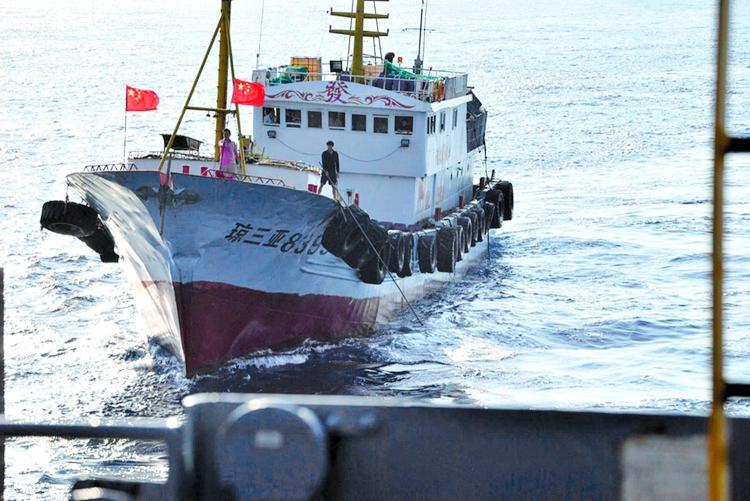 <a><img src="https://www.theepochtimes.com/assets/uploads/2015/09/ship2.jpg" alt="A crewmember on a Chinese trawler uses a grapple hook in an apparent attempt to snag the towed acoustic array of the military Sealift Command ocean surveillance ship USNS Impeccable (Courtesy of U.S. Navy)" title="A crewmember on a Chinese trawler uses a grapple hook in an apparent attempt to snag the towed acoustic array of the military Sealift Command ocean surveillance ship USNS Impeccable (Courtesy of U.S. Navy)" width="320" class="size-medium wp-image-1829699"/></a>