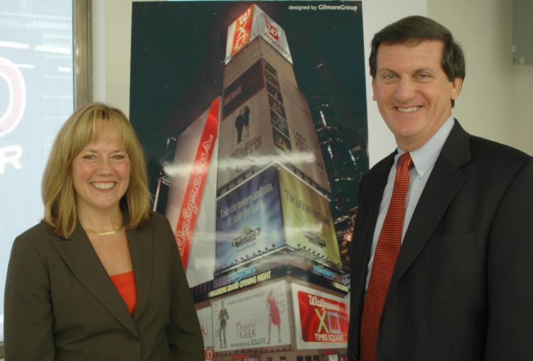 <a><img src="https://www.theepochtimes.com/assets/uploads/2015/09/sign.jpg" alt="WALGREENS RETURNS: Kim Feil and Craig Sinclair pose in front of a rendering of what their new giant LED sign will look like at night in the heart of Times Square. (Jonathan Weeks/Epoch Times)" title="WALGREENS RETURNS: Kim Feil and Craig Sinclair pose in front of a rendering of what their new giant LED sign will look like at night in the heart of Times Square. (Jonathan Weeks/Epoch Times)" width="320" class="size-medium wp-image-1832832"/></a>