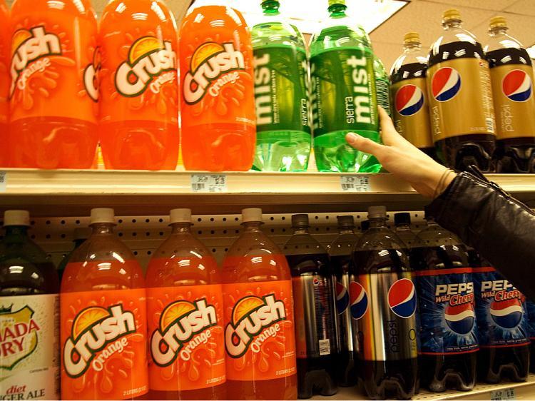 <a><img src="https://www.theepochtimes.com/assets/uploads/2015/09/sodatax.jpg" alt="SODA TAX: A New Yorker reaches for a bottle of soda at a store in Midtown Manhattan on Tuesday. Governor David Paterson's proposed budget would add a 12 cent tax on cans of soda. (Jack Phillips/The Epoch Times)" title="SODA TAX: A New Yorker reaches for a bottle of soda at a store in Midtown Manhattan on Tuesday. Governor David Paterson's proposed budget would add a 12 cent tax on cans of soda. (Jack Phillips/The Epoch Times)" width="320" class="size-medium wp-image-1822045"/></a>
