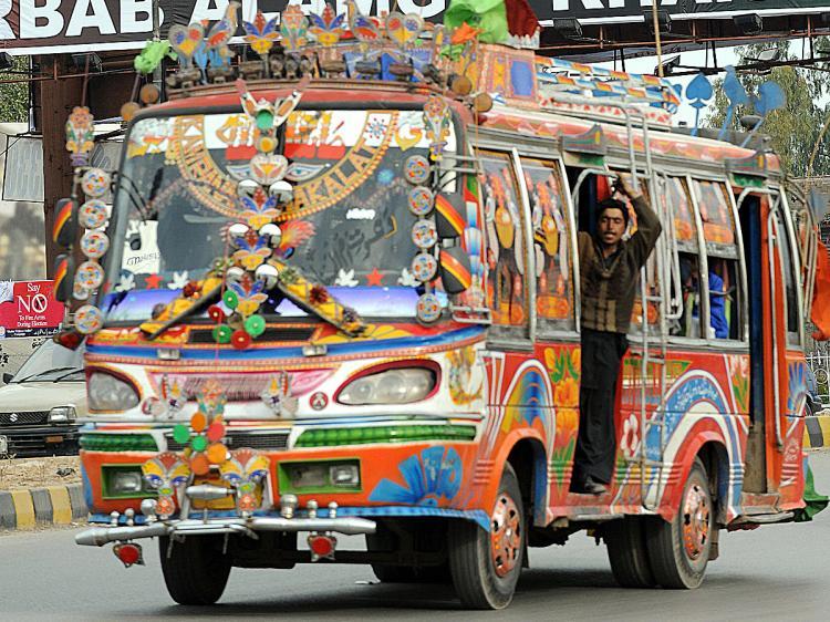 <a><img src="https://www.theepochtimes.com/assets/uploads/2015/09/sub79735851.jpg" alt="Pakistani commuters travel in a bus through the city of Peshawar. (Saeed Khan/AFP/Getty Images)" title="Pakistani commuters travel in a bus through the city of Peshawar. (Saeed Khan/AFP/Getty Images)" width="320" class="size-medium wp-image-1832327"/></a>