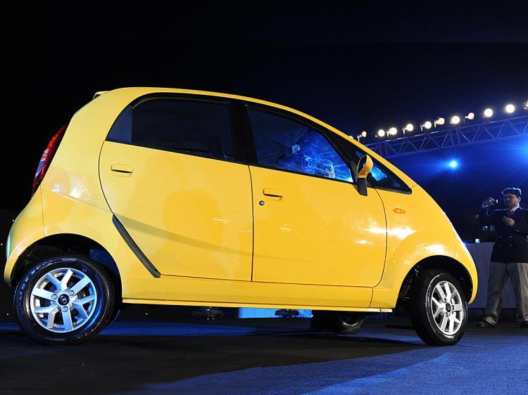 <a><img src="https://www.theepochtimes.com/assets/uploads/2015/09/tytytt85562701.jpg" alt="A Tata Nano car is seen during the vehicle's launch in Mumbai on March 23, 2009. (Sajjad Hussain/AFP/Getty Images)" title="A Tata Nano car is seen during the vehicle's launch in Mumbai on March 23, 2009. (Sajjad Hussain/AFP/Getty Images)" width="320" class="size-medium wp-image-1829331"/></a>