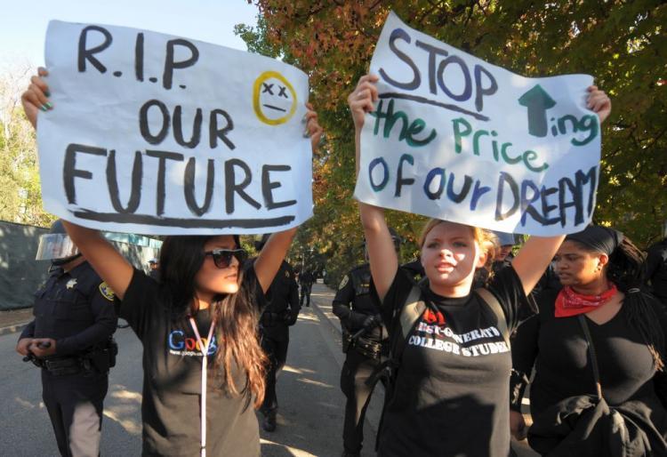 <a><img src="https://www.theepochtimes.com/assets/uploads/2015/09/uc93240339.jpg" alt="Student protesters hold banners outside a police line during a protest against an increase in student fees at the UCLA campus in Los Angeles on Nov. 19. (Mark Ralston/AFP/Getty Images)" title="Student protesters hold banners outside a police line during a protest against an increase in student fees at the UCLA campus in Los Angeles on Nov. 19. (Mark Ralston/AFP/Getty Images)" width="320" class="size-medium wp-image-1825092"/></a>