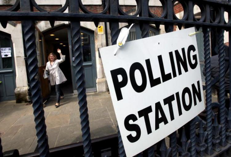 <a><img src="https://www.theepochtimes.com/assets/uploads/2015/09/uk_election_98880964.jpg" alt="British Election Exit Poll: A woman leaves a polling station on Brick Lane after casting her vote on May 6, 2010 in London, UK. (Dan Kitwood/Getty Images)" title="British Election Exit Poll: A woman leaves a polling station on Brick Lane after casting her vote on May 6, 2010 in London, UK. (Dan Kitwood/Getty Images)" width="320" class="size-medium wp-image-1820244"/></a>