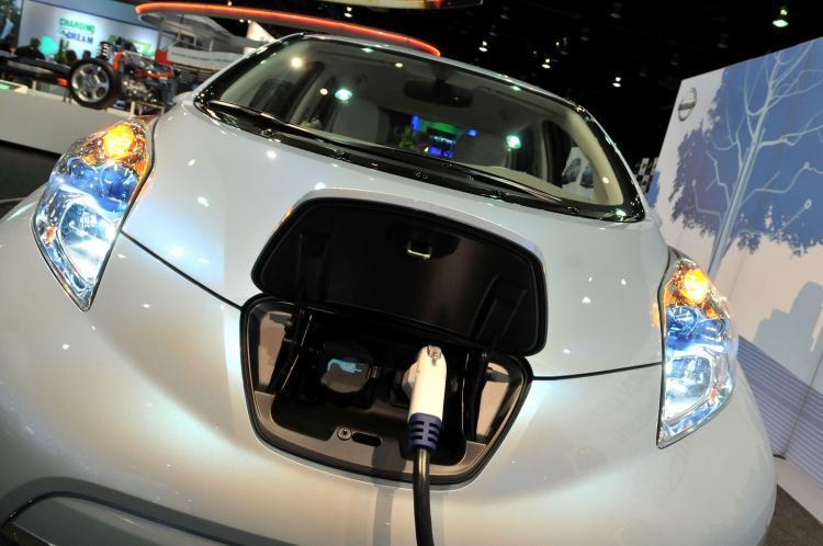 <a href="https://www.theepochtimes.com/assets/uploads/2015/10/95727765Electric.jpg"><img src="https://www.theepochtimes.com/assets/uploads/2015/10/95727765Electric.jpg" alt="PLUGGED IN: The 2011 Nissan Leaf can go up to 100 miles on a single electric charge (Bryan Mitchell/Getty Images)" title="PLUGGED IN: The 2011 Nissan Leaf can go up to 100 miles on a single electric charge (Bryan Mitchell/Getty Images)" width="320" class="size-medium wp-image-1870244"/></a>