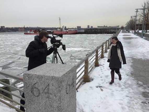 Paulio Shakespeare films Falun Gong practitioner Pan Qi beside the Hudson River for a scene in "The Persecution of Falun Gong." (Courtesy of Paulio Shakespeare)