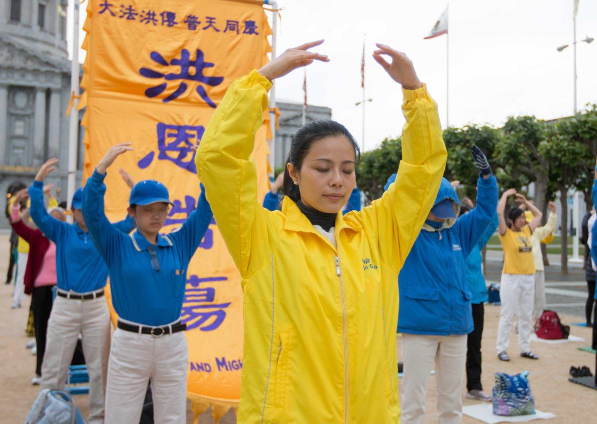 Falun Dafa exercises performed during World Falun Dafa Day Celebrations on May 7. (Lihui Zhou/Epoch Times)