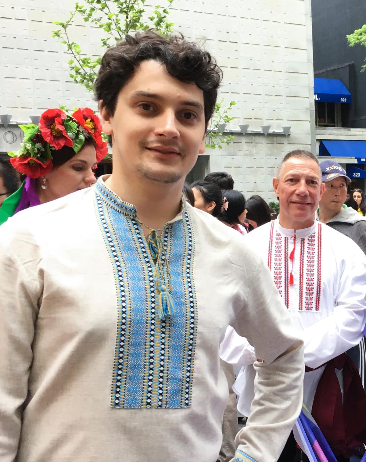 Oleksandr Nimenko, a Falun Dafa practitioner from Kyiv, Ukraine, marches in the World Falun Dafa Day parade in New York City on May 13, 2016. (Larry Ong/Epoch Times)