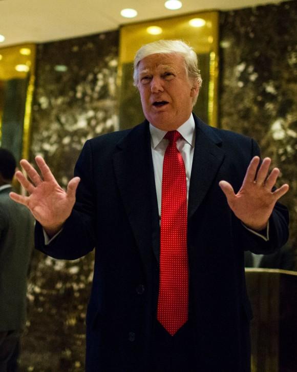 US President-elect Donald Trump speaks to the media at Trump Tower in New York on Dec. 6, 2016. (EDUARDO MUNOZ ALVAREZ/AFP/Getty Images)