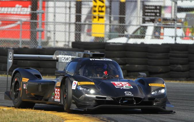 Mazda's Riley-based RT24-P rounds the International Horseshoe at Daytona International Speedway during IMSA's WSC test, Dec 13–14, 2016. (Chris Jasurek/Epoch Times)
