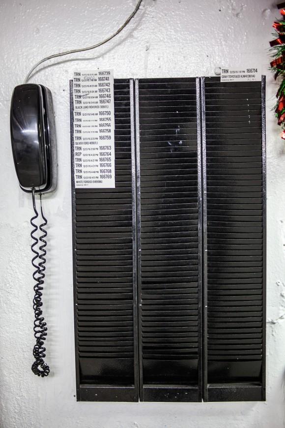 Board at Champion Park garage on 56th St. in Manhattan on Dec. 27, 2016. It shows only 18 cars in, but the garage is usually full, according to the garage worker Luis Ortic. (Petr Svab/Epoch Times)