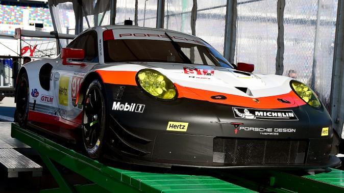 The new mid-engined #911 Porsche GT Team 911 RSR awaits technical inspection before the start or the Roar. (Bill Kent/Epoch Times)