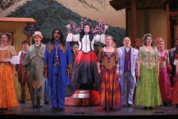 Cáitlín Burke as Katisha (C) and company in the first act finale. (Carol Rosegg)