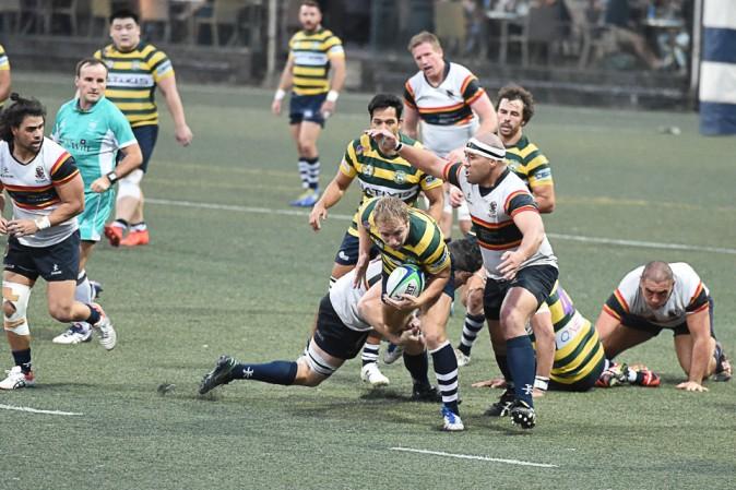Natixis HKFC push forward for their 31-28 win against Herbert Smith Freehills HKCC in their HKRFU Premiership match at Sports Road on Satay Jan 5, 2017. Bill Cox/Epoch Times)