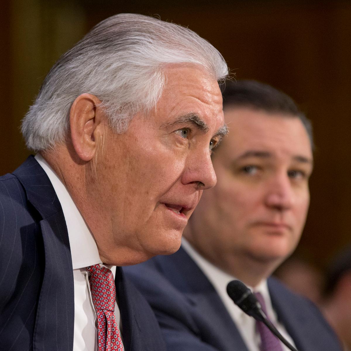 Secretary of State-designate Rex Tillerson, left, accompanied by Sen. Ted Cruz, R-Texas on Capitol Hill in Washington on Jan. 11, 2017. (AP Photo/Steve Helber)
