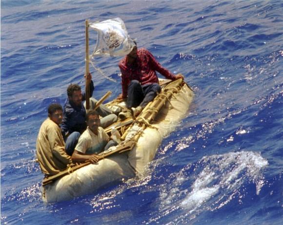 Cuban refugees float in seas, 60 miles south of Key West, Fla. in this Aug. 26, 1994 file photo. (AP Photo/Dave Martin, File)