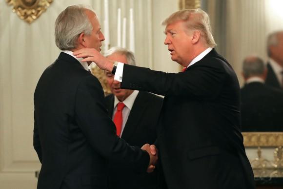 President Donald Trump (R) greets Boeing Chairman James McNerney at the beginning of a policy forum in the State Dining Room at the White House in Washington on Feb. 3, 2017. (Chip Somodevilla/Getty Images)