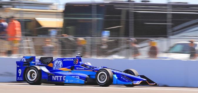 Scott Dixon roars down the front straight during morning practice. (Chris Jasurek/Epoch Times)