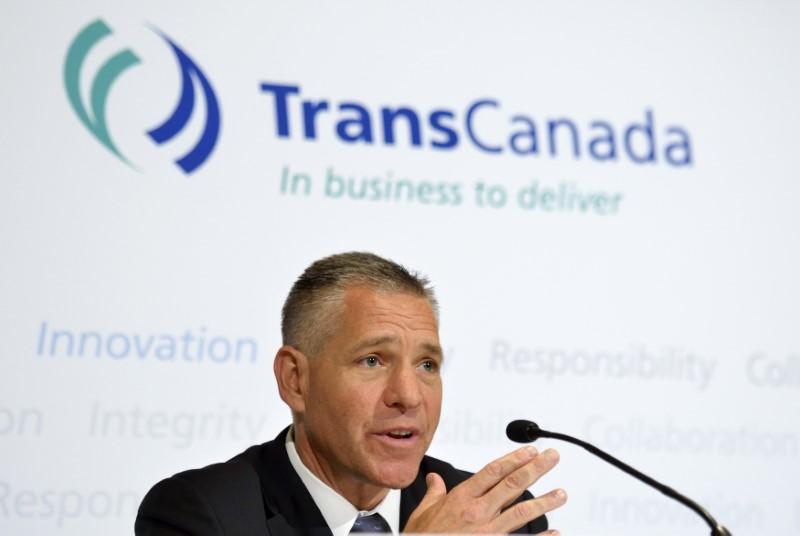 TransCanada President and Chief Executive Officer Russ Girling addresses the media after the Annual General Meeting in Calgary in Alberta on May 2, 2014. (REUTERS/Mike Sturk)