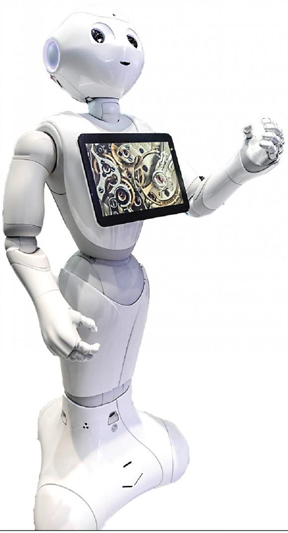 Pepper, an interactive robot from IBM's Watson AI department, at the digital business fair CeBIT in Hanover, Germany, on March 15, 2016. (JOHN MACDOUGALL/AFP/Getty Images)