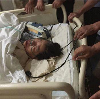 Bai Gendi in the hospital in late August. (Minghui.org)