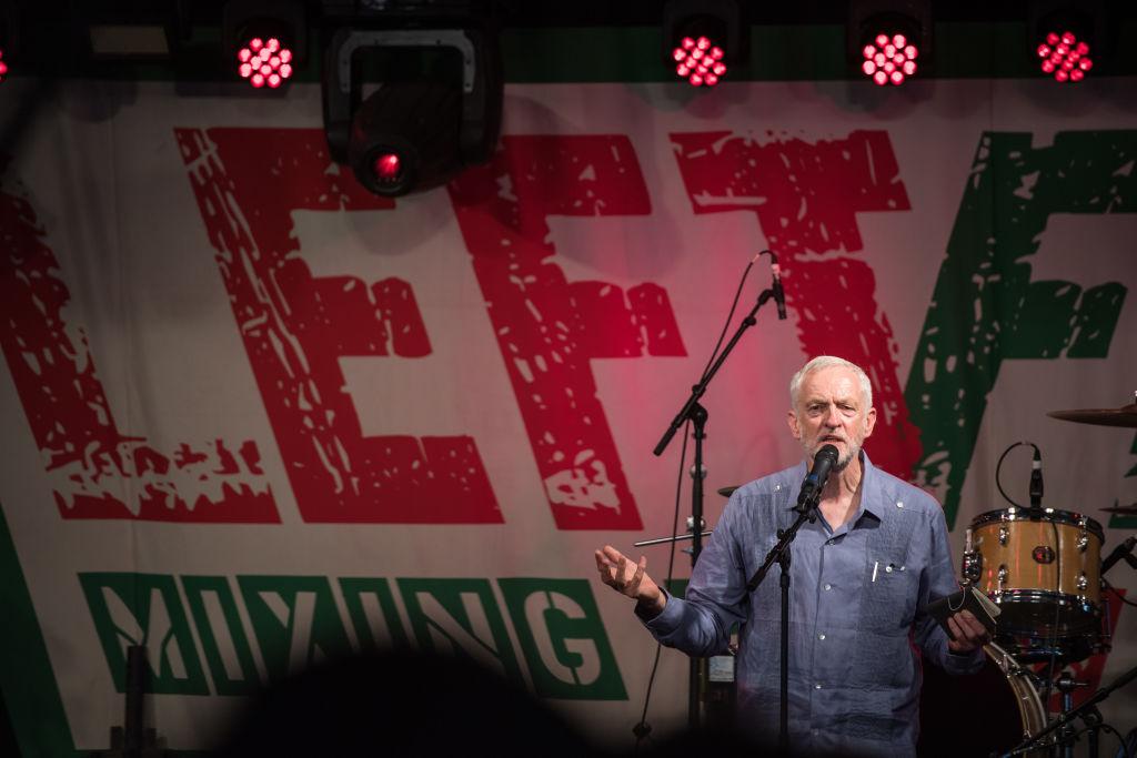 Labour Party leader Jeremy Corbyn speaks to crowds at Left Field Stage at Glastonbury Festival in Glastonbury, England, on June 24, 2017. (Chris J Ratcliffe/Getty Images)