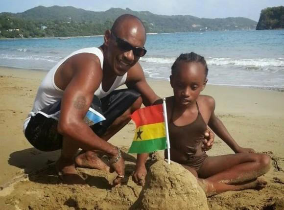 AbbieGail Smith on the beach with her father Kenroy Smith. (Facebook)