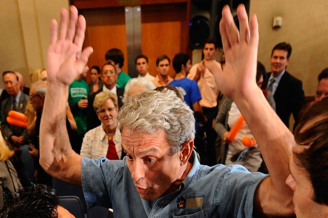 Ed Buck (C), is confronted by security after disrupting California Republican Party gubernatorial candidate Meg Whitman's campaign event on September 22, 2010 in Los Angeles, California.(Kevork Djansezian/Getty Images)
