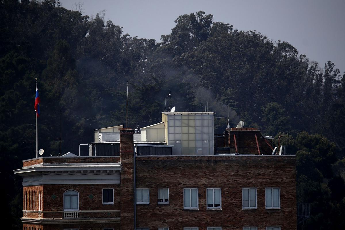Black smoke billows from a chimney on top of the Russian consulate in San Francisco, Calif., on Sept. 1, 2017. In response to a Russian government demand for the United States to cut its diplomatic staff in Russia by 455, the Trump administration ordered the closure of three consular offices in the San Francisco, New York and Washington. (Justin Sullivan/Getty Images)