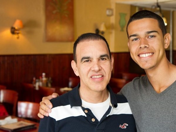 Ramon Olivo, and his son Elvis, inside Olivo's Brooklyn restaurant