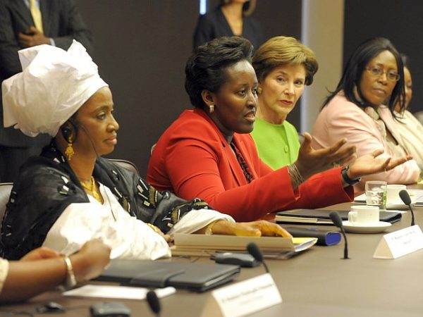Rwanda first lady Jeannette Kagame (in red) shares a laugh with former U.S. first lady Laura Bush during the RAND African First Ladies Initiative roundtable summit at the Ford Foundation headquarters in New York City Sept. 26. (RAND)