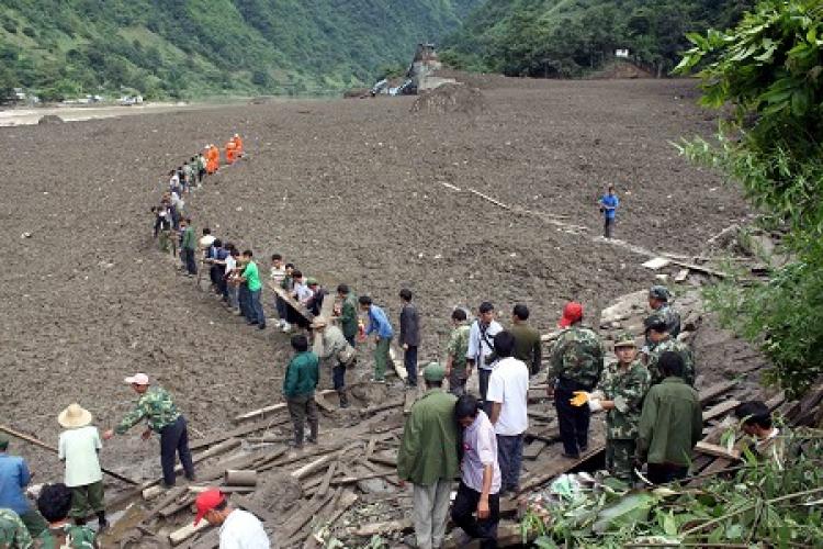 A large and sudden mudslide, close to 1,000 feet in width, hit Yunan Province in China's southwest on Aug. 18 (Epoch Times photo achives )