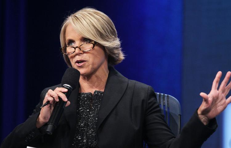 Katie Couric, anchor and managing editor of CBS Evening News, is photographed here speaking at a conference in New York City in September. (Mario Tama/Getty Images)