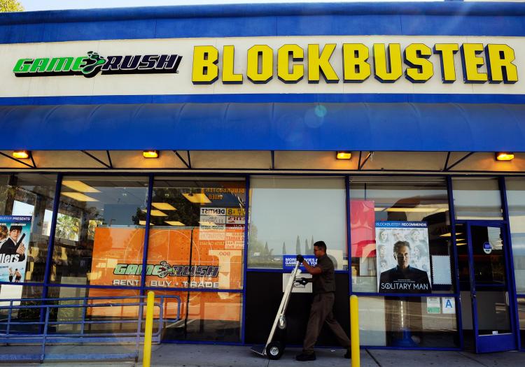 SOLD: A UPS driver makes a delivery at Blockbuster store last September in Glendale, California. The video-rental business which filed for Chapter 11 bankruptcy in September, agreed to sell itself for $290 million to its current debt holders. (Kevork Djansezian/Getty Images)