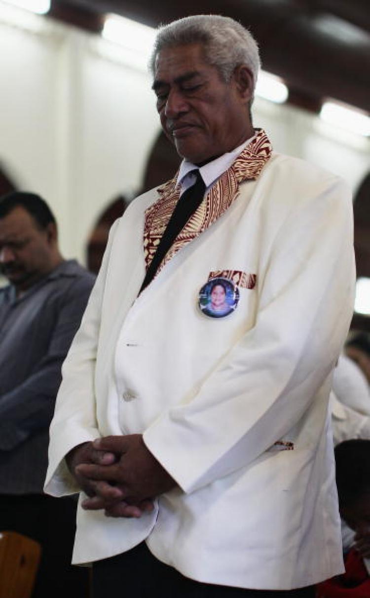 A Samoan man attends a church service to remember victims of the tsunami on Sept. 29, in Lalomanu, Samoa. 189 people were killed and hundreds more injured in Samoa, American Samoa, and Tonga.  (Hannah Johnston/Getty Images)