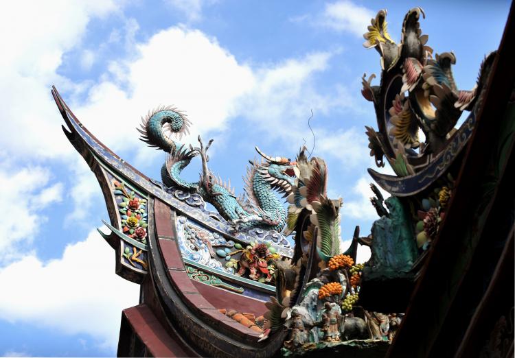 Sculptures featuring a flying dragon, a legendary creature for thousands of years in China, other animals and Taoist deities stand on the roof of a popular temple in Taipei on Sept. 26, 2010. (Patrick Lin/AFP/Getty Images)
