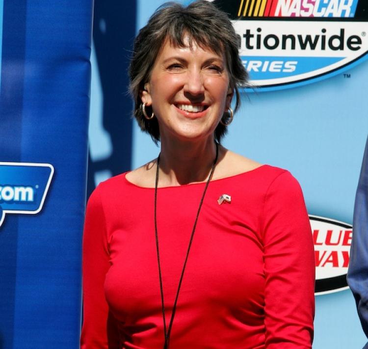 Carly Fiorina, Republican nominee for the United States Senate representing California, stands on stage prior to the NASCAR Nationwide Series CampingWorld.com 300 on October 9, in Fontana, CA.  (Jerry Markland/Getty Images)