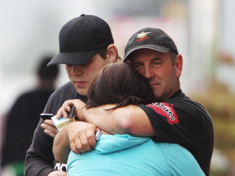 Worried friends and family outside the Red Cross Welfare Centre on Nov. 20,  in Greymouth, New Zealand.  (Hagen Hopkins/Getty Images)