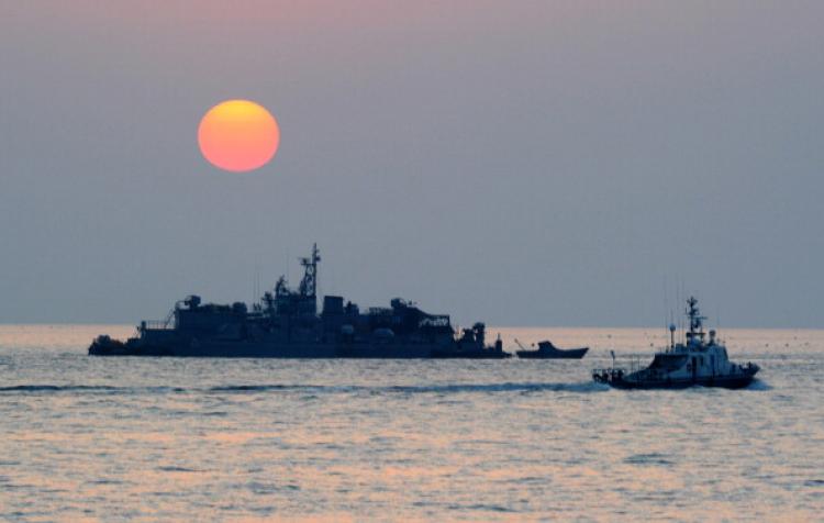 A South Korean goverment ship (R) sails by Navy MSB (Movement Sea Base) off the South Korea-controlled island of Yeonpyeong . (Kim Jae-Hwan/AFP/Getty Images)