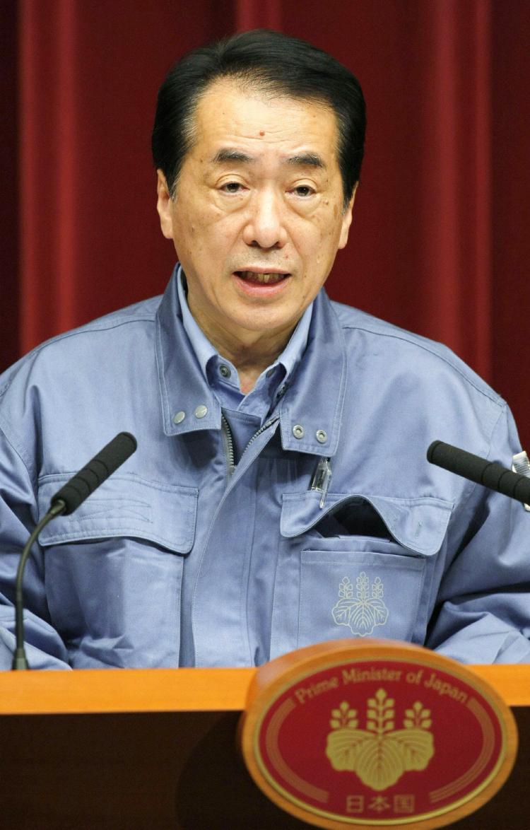 Japanese Prime Minister Naoto Kan speaks at a press conference at the prime minister's official residence in Tokyo on March 15. Kan advised people living between 12 and 19 miles of the Fukushima Daiichi nuclear power plant to stay indoors. (STR/AFP/Getty Images)